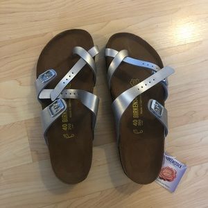 Brandy new silver Birkenstocks!!